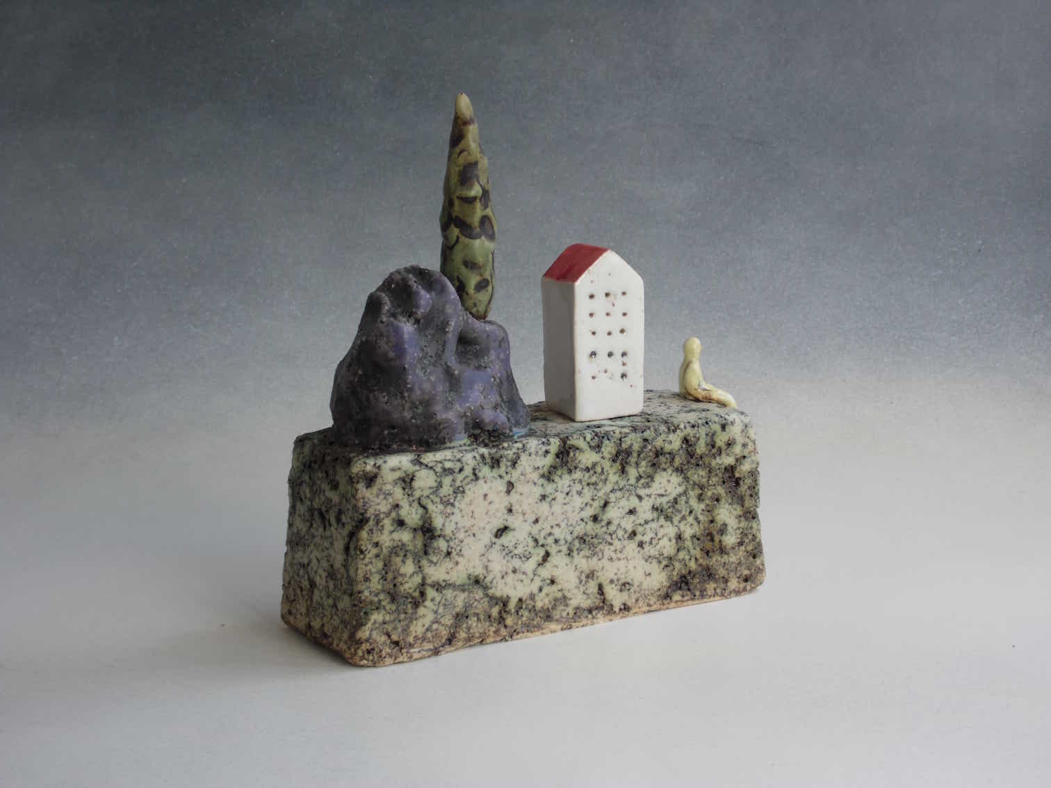 One%20Tree%20with%20House%20and%20Yellow%20Sitting%20Man