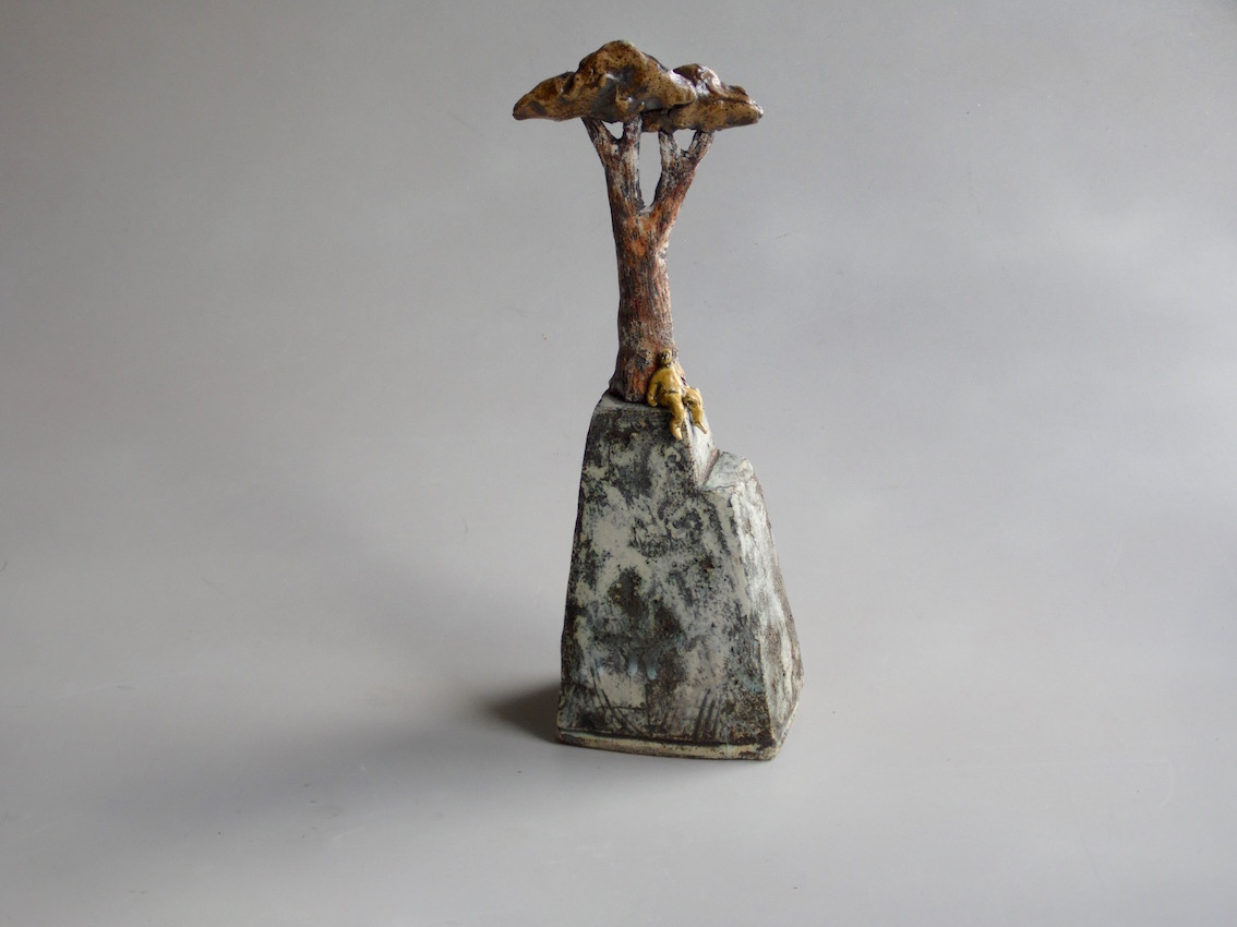 Yellow%20Figure%20Under%20Tree